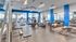 Fitness center with cardio and weight machines and free weights
