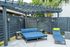 Chic outdoor lounge area with stylish pergola, cozy seating, and modern fencing, perfect for relaxation and entertainment.