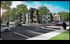 Charming residential community with modern, stylish apartments surrounded by lush greenery and ample parking.