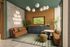 Stylish lounge area showcasing modern couches, a wall-mounted TV, and a welcoming neon sign, perfect for relaxation and entertainment.