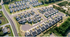 Charming suburban community with neatly arranged homes and lush greenery, offering a peaceful residential setting.