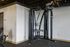Modern fitness center featuring a versatile exercise machine with sleek design, perfect for convenient home workouts.