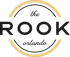 Elegant logo of The Rook Orlando featuring a modern circular design with a sleek gold accent.
