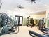 Modern fitness center with state-of-the-art exercise machines and sleek design, perfect for an active lifestyle.