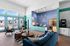 Stylish and welcoming lobby of Aspen Heights, featuring modern seating, vibrant decor, and ample natural light.