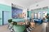 Modern lobby area of Aspen Heights with stylish furniture, bright colors, and welcoming design.