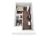 Charming studio layout featuring a cozy bedroom area, compact bathroom, and sleek workspace with warm wood flooring.