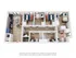 Modern apartment floor plan showcasing 4 bedrooms, open-concept living area, sleek kitchen, and dual bathrooms with a laundry area.