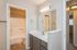 bathroom sink and separate toilet and shower