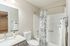 bathroom sink, shower, and toilet