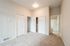 vacant bedroom with large closet