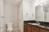 bathroom sink, shower, and toilet
