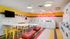 Laundry facilities with tables and chairs