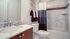 Bathroom with one sink, toilet, and shower