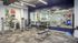 Fitness center with cardio and weight machines and free weights