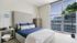 Furnished bedroom with gorgeous view