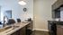 Kitchen with black appliances and wood cabinets
