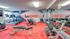 Fitness center with cardio and weight machines and free weights