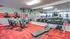 Fitness center with cardio and weight machines and free weights