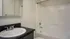 Bathroom with sink, toilet, and shower/tub