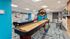 Game room with shuffleboard and air hockey