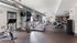 Fitness center with cardio and weight machines and free weights