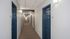 Hallway with blue doors