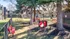 Dog park with trees and dog obstacles