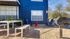 Picnic table, chairs and grill