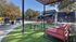 Poolside cabanas on grassy area