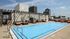 Pool area with lounge chairs