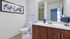 Bathroom with one sink, toilet, and shower