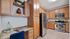 Kitchen With Desk Nook | Apartments Near Naperville IL | ReNew Downer's Grove