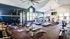 Fitness center with cardio and weight machines and free weights