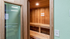 Arrive 4301 Sauna with Wood Paneling and Light Fixtures