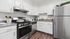 Kitchen with stainless steel appliances and white cabinets