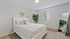 Arrive 4301 Bedroom with Modern Light Fixtures and Window