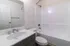 bathroom sink, shower, and toilet