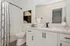 bathroom sink, shower, and toilet