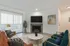 furnished living room with fireplace