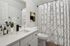 bathroom sink, shower, and toilet