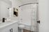bathroom sink, shower, and toilet