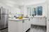kitchen with stainless steel appliances and white cabinets