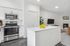 kitchen with stainless steel appliances and white cabinets