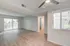 Arrive Santa Clarita Open Living Room with Sliding Glass Doors to Balcony