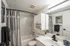bathroom sink, shower, and toilet