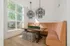 Arrive Chads Ford Clubhouse Seating with Large Window and Modern Chandelier