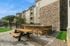 Arrive Chadds Ford Community Grill Area with Bar and Picnic Seating
