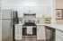 Arrive Chadds Ford Modern Kitchen with White Cabinetry and Stainless Steel Cabinets