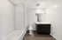 888 at Grand Hope Park Modern Bathroom Featuring a Vanity with Contemporary Fixtures